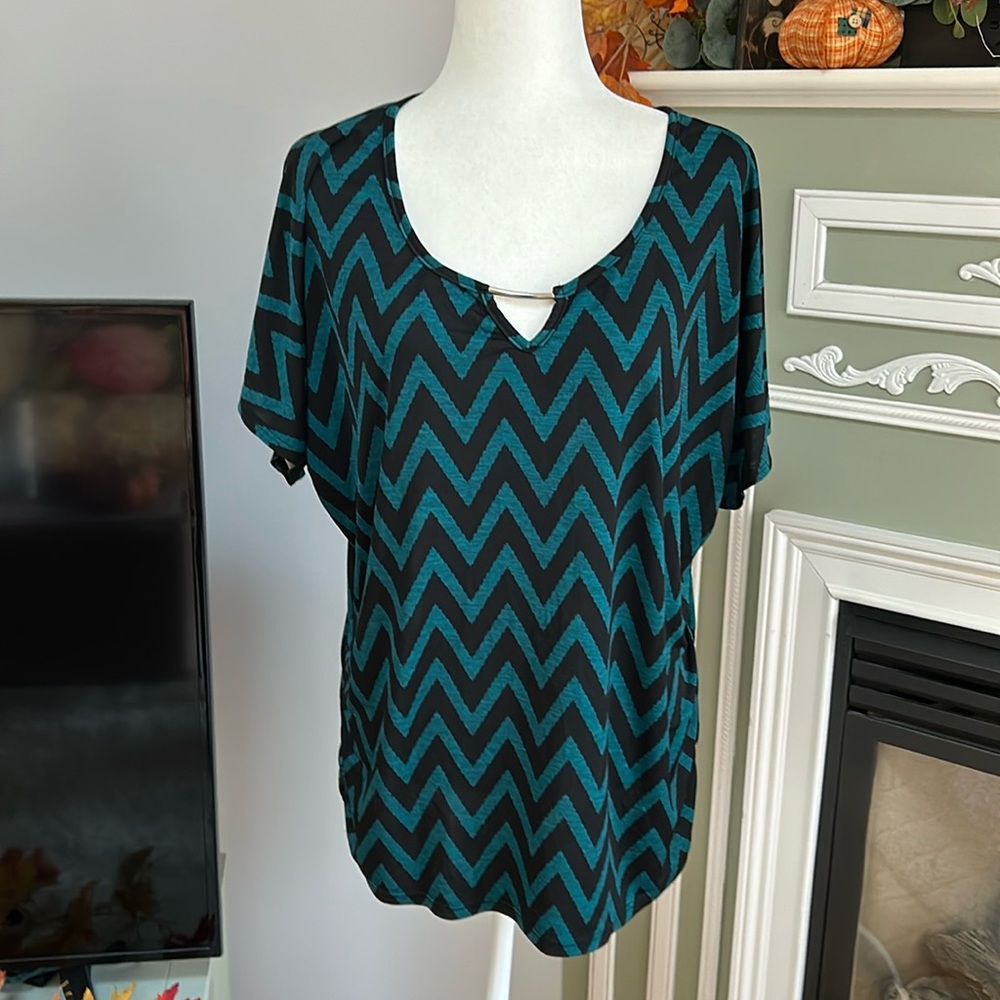 Lavish Plush chevron top with metal neck feature and ruched sides